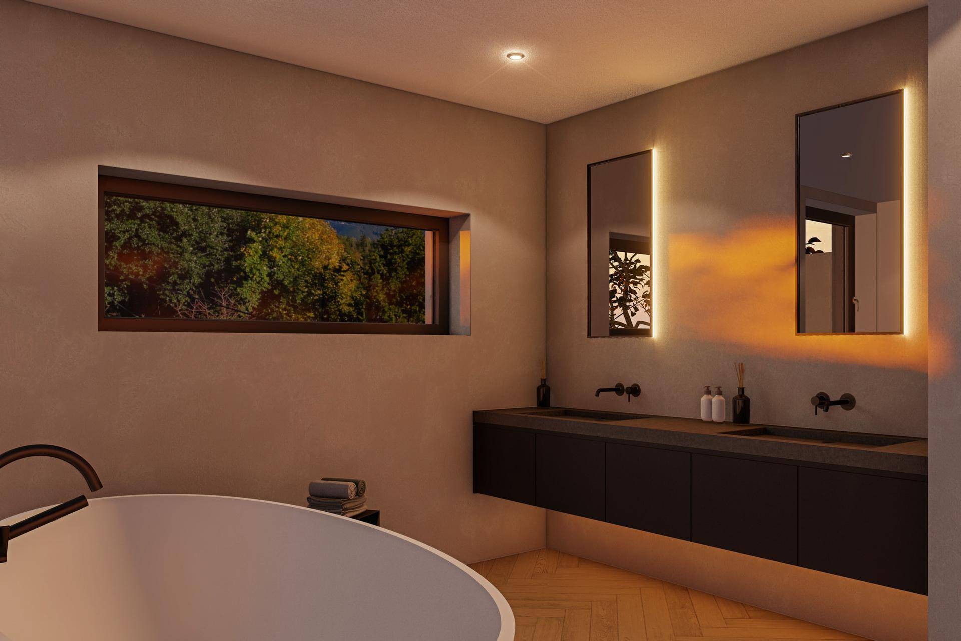 Modernes Badezimmer mit freistehender Badewanne, Doppelwaschbecken und Fenster mit Waldblick.