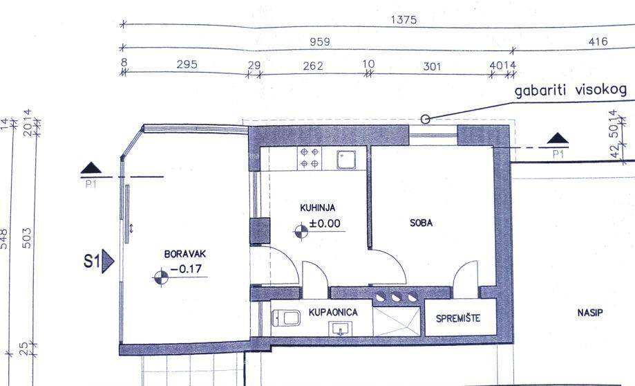 Grundriss der Wohnung S1 mit Küche, Schlafzimmer, Bad und Abstellraum.