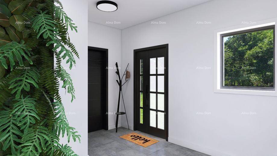Heller Eingangsbereich mit Fliesenboden, Fenster und dekorativer Pflanze.