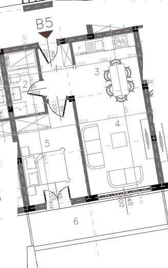 Ausschnitt eines Grundrisses für Wohnung B5 mit Küche, Wohnzimmer, Schlafzimmer und Terrasse.