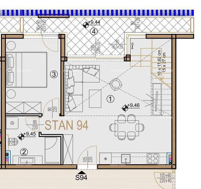 Grundriss einer Wohnung mit offenem Wohn-Essbereich, Küche, Schlafzimmer und Balkon.
