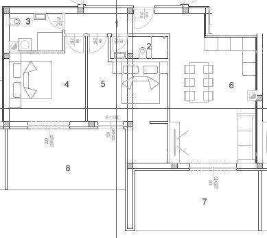 Grundriss einer Wohnung mit Schlafzimmern, Bad, WC und offenem Wohnbereich.
