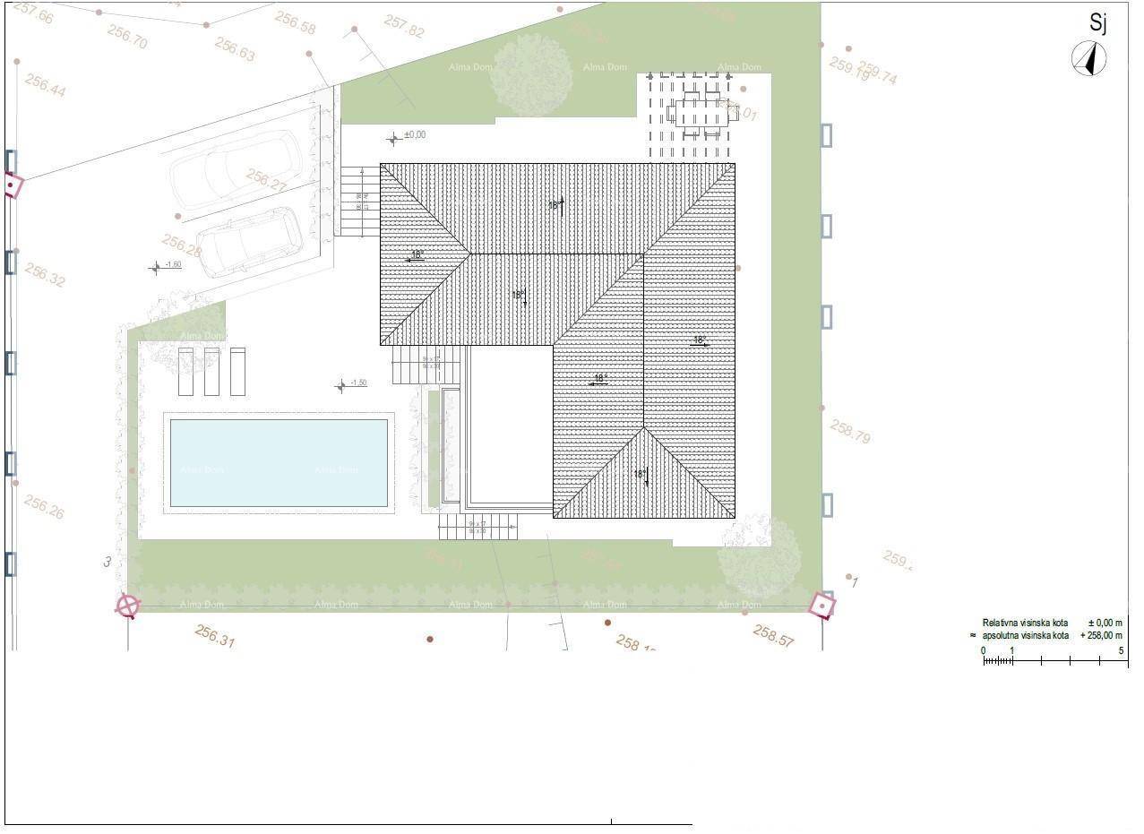 Dachaufsicht des Anwesens mit Ziegeldächern, Pool und Parkplätzen.