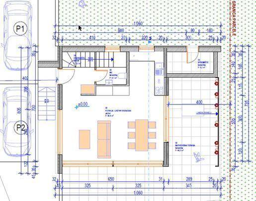 Grundriss des Erdgeschosses mit offenem Wohnbereich, Küche und Terrasse.
