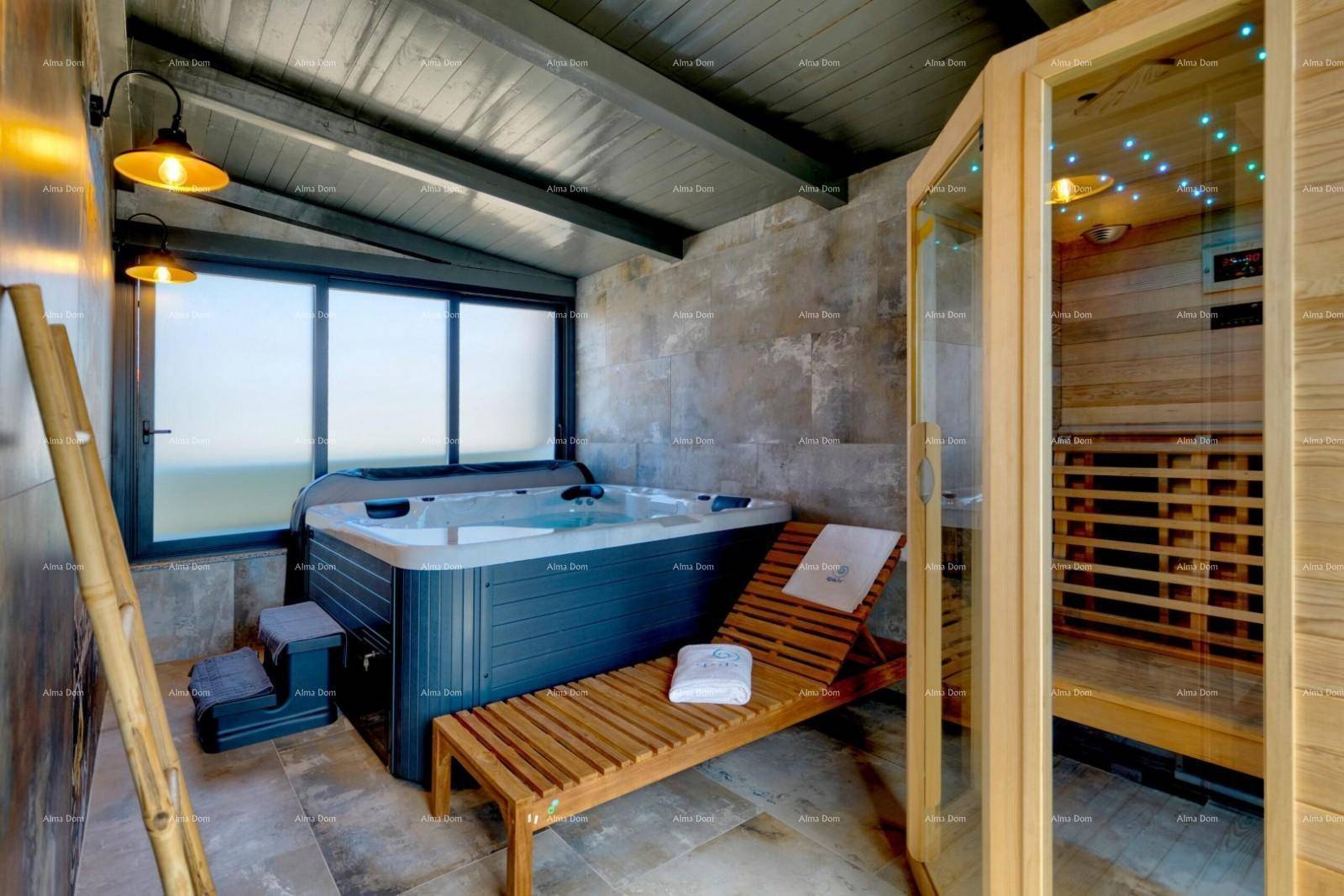 Entspannender Wellnessbereich mit Whirlpool, Sauna und Liegefläche mit Ausblick.