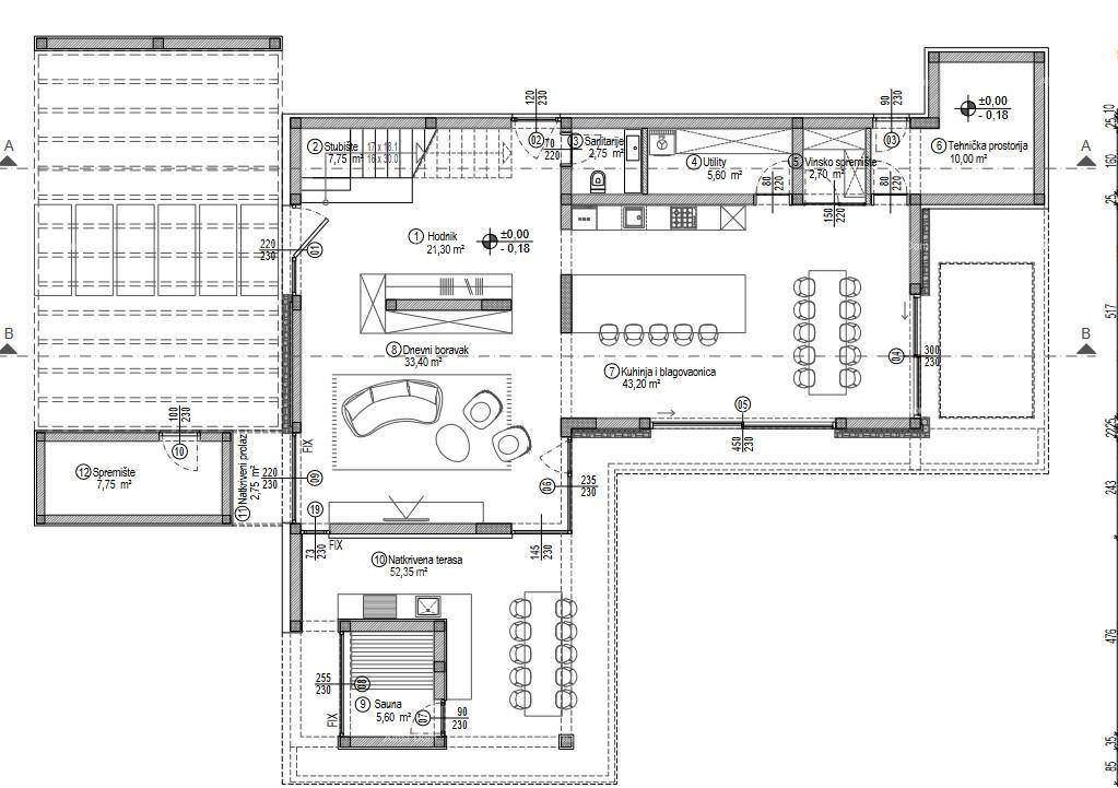 Grundriss des Erdgeschosses mit Wohnbereich, Küche, Esszimmer und Sauna.