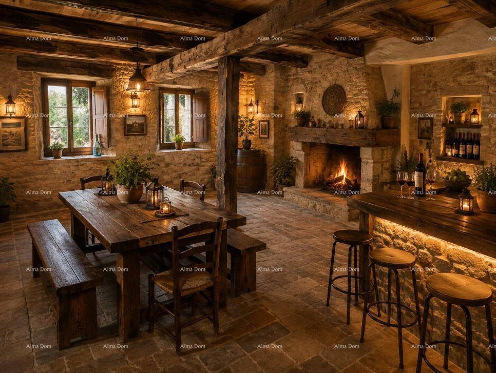 Rustikaler Essbereich mit Steinfliesen, Holzbalken, Kamin und einer gemütlichen Bar.