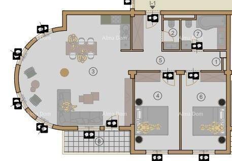 Grundriss einer Wohnung mit offenem Wohnbereich, zwei Schlafzimmern und einer Terrasse.