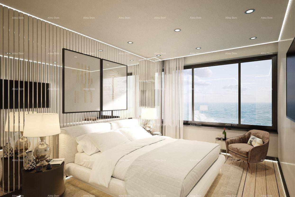 Helles Schlafzimmer mit Meerblick, großem Fenster und moderner Einrichtung.