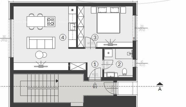 Grundriss einer Wohnung mit offenem Wohnbereich, Schlafzimmer und Badezimmer.