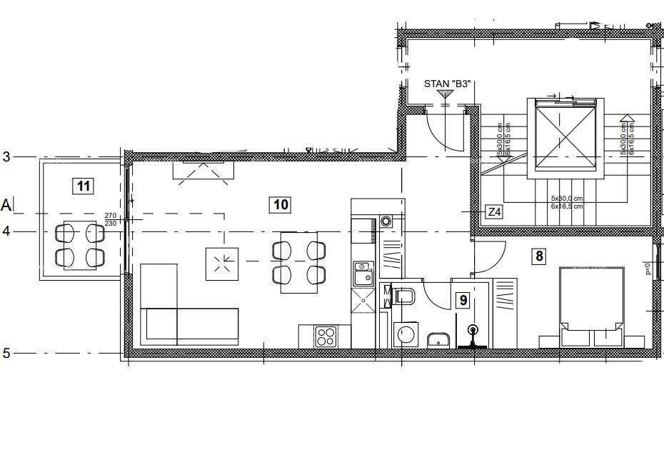Detaillierter Grundriss einer Wohnung mit offenem Wohnbereich, Schlafzimmer und Balkon.