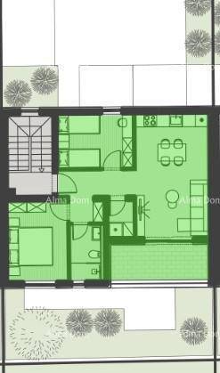 Grundriss einer Wohneinheit mit offenem Wohnbereich, Schlafzimmer und Bad.