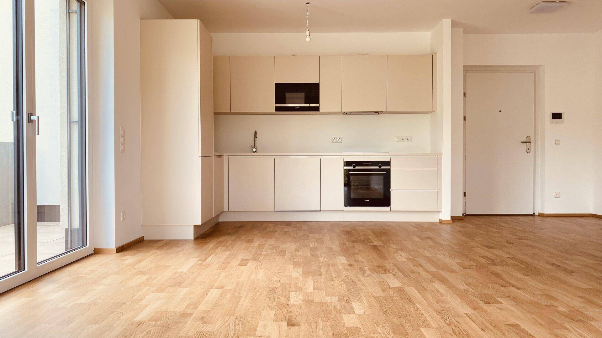 Neubau Erstbezug Gemütliche Drei Zimmer Wohnung mit Balkon und Grünblick - Ansicht 2