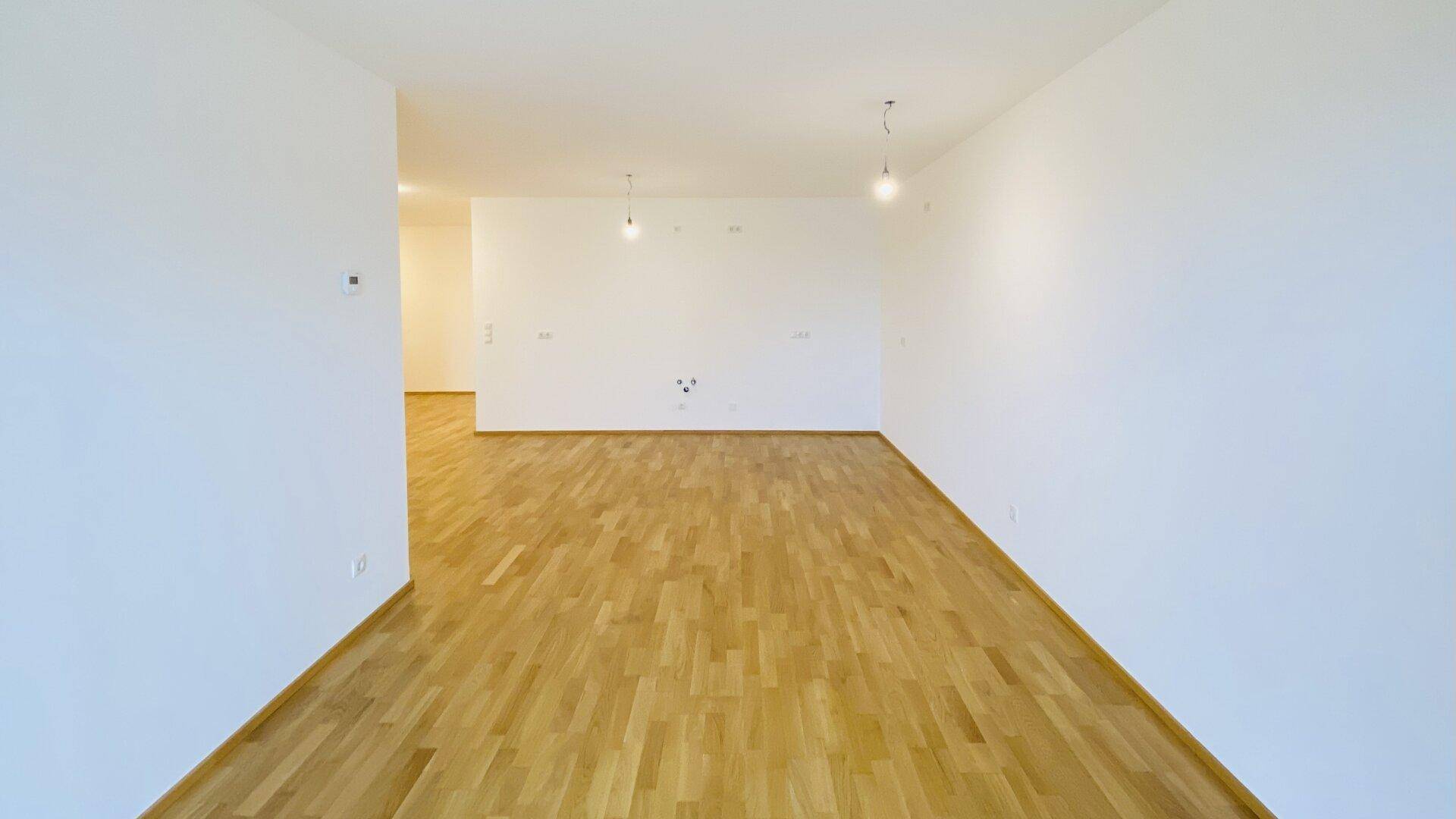 Neubau Erstbezug Drei Zimmer Wohnung mit großflächigem Außenbereich und traumhaften Ausblick - Ansicht 5