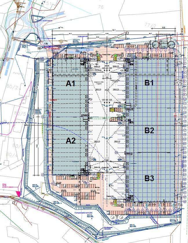 Übersichtsplan eines neuen Gewerbe- und Industrieparks mit mehreren Hallen, Parkplätzen und Zufahrtswegen.