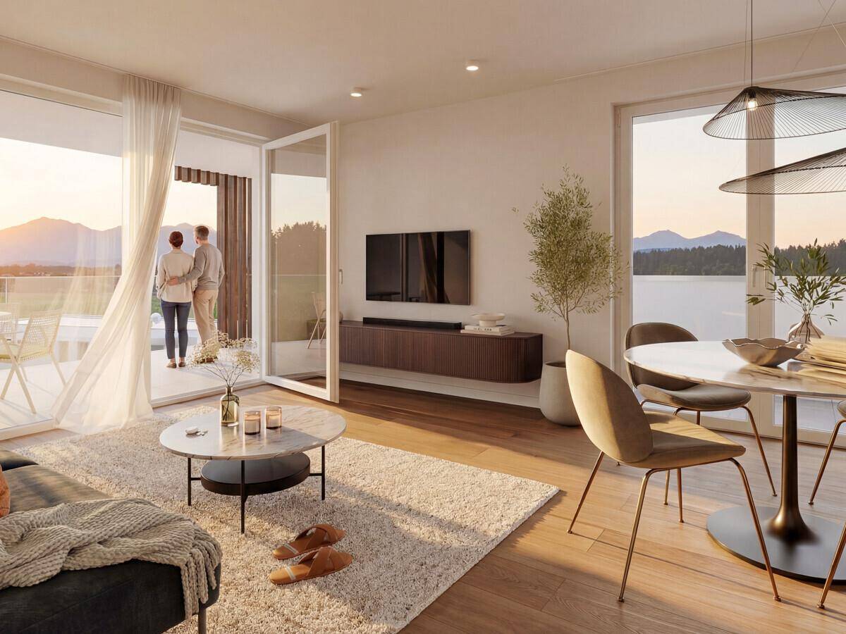 Heller Wohn- und Essbereich mit Holzboden, modernen Möbeln und Zugang zum Balkon mit Seeblick.