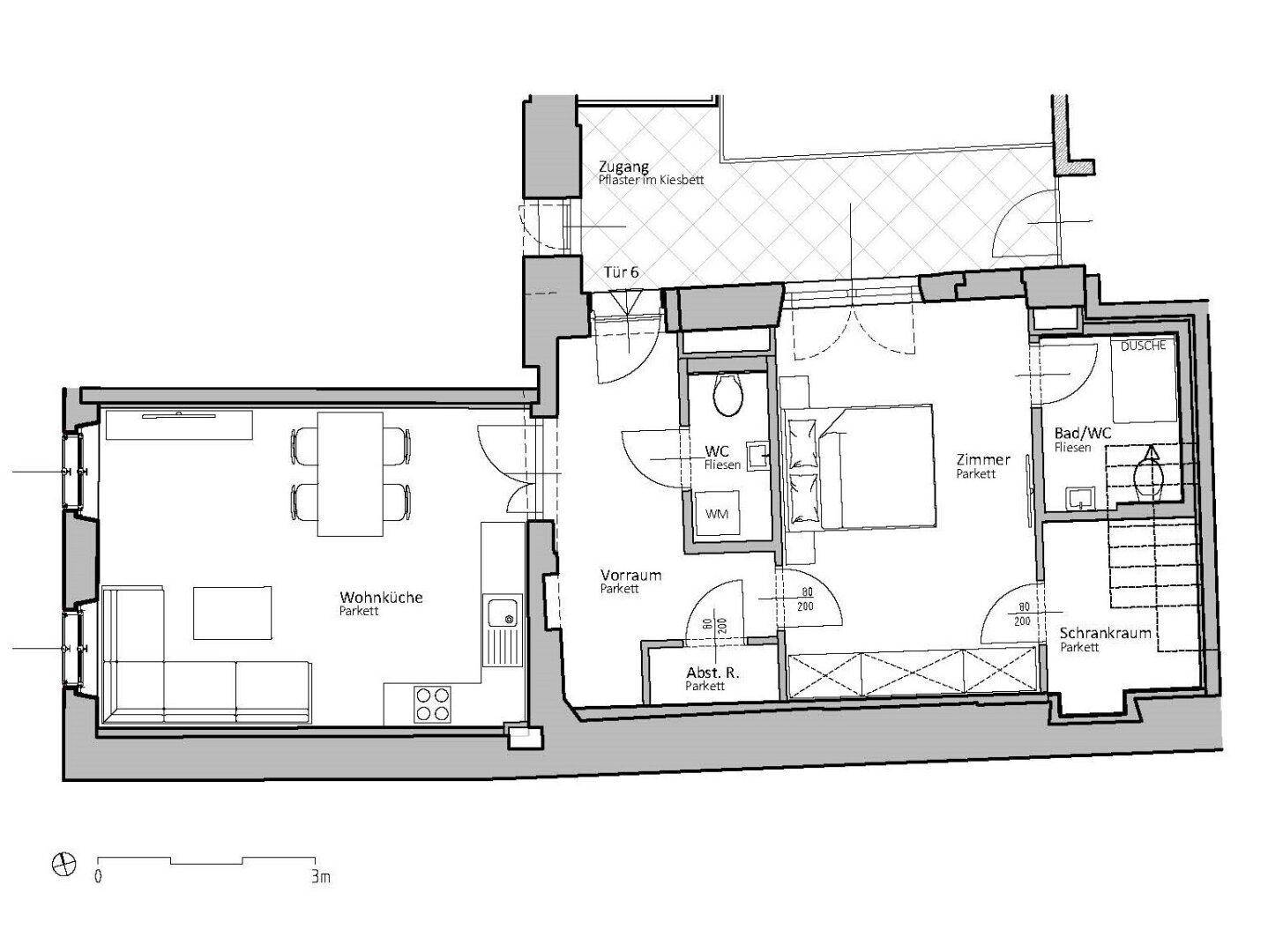 Detaillierter Grundriss einer Wohnung mit Wohnküche, Schlafzimmer, Bad und Balkon.