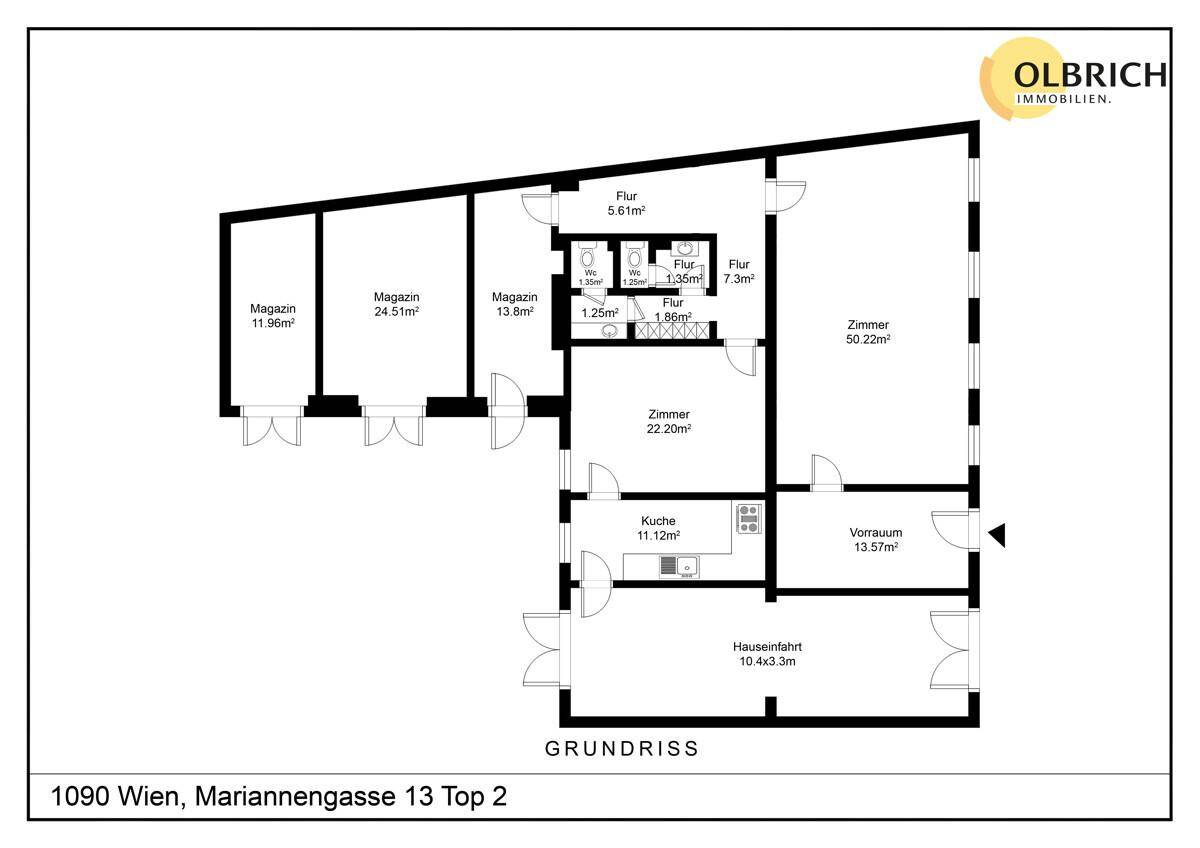 Grundrissplan einer Gewerbefläche mit mehreren Lagerräumen, einer kleinen Küche und zwei Toiletten.