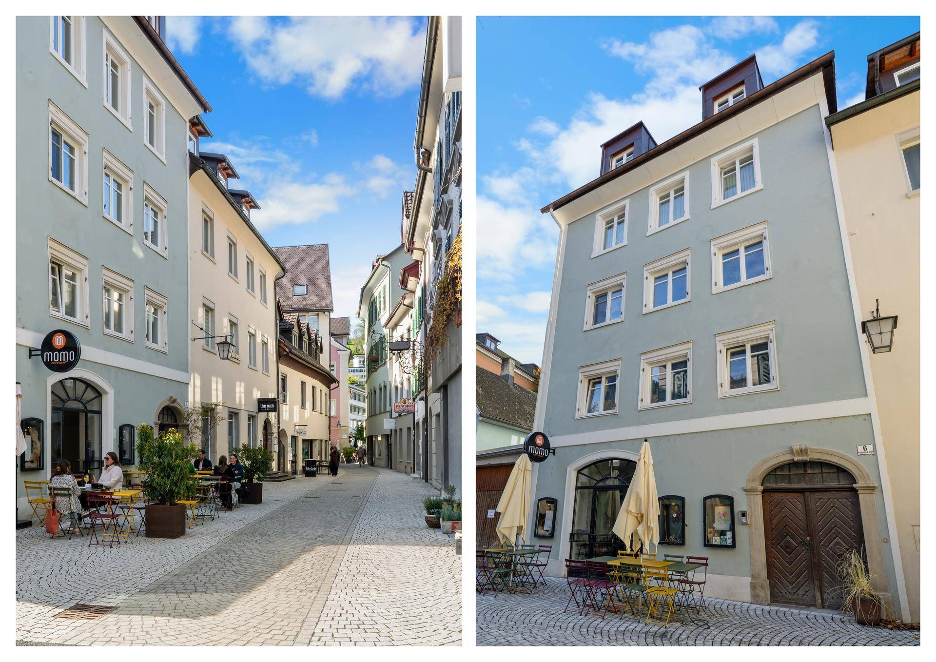 Historische Gasse in der Altstadt mit charmanten Gebäuden und Außengastronomie unter blauem Himmel.