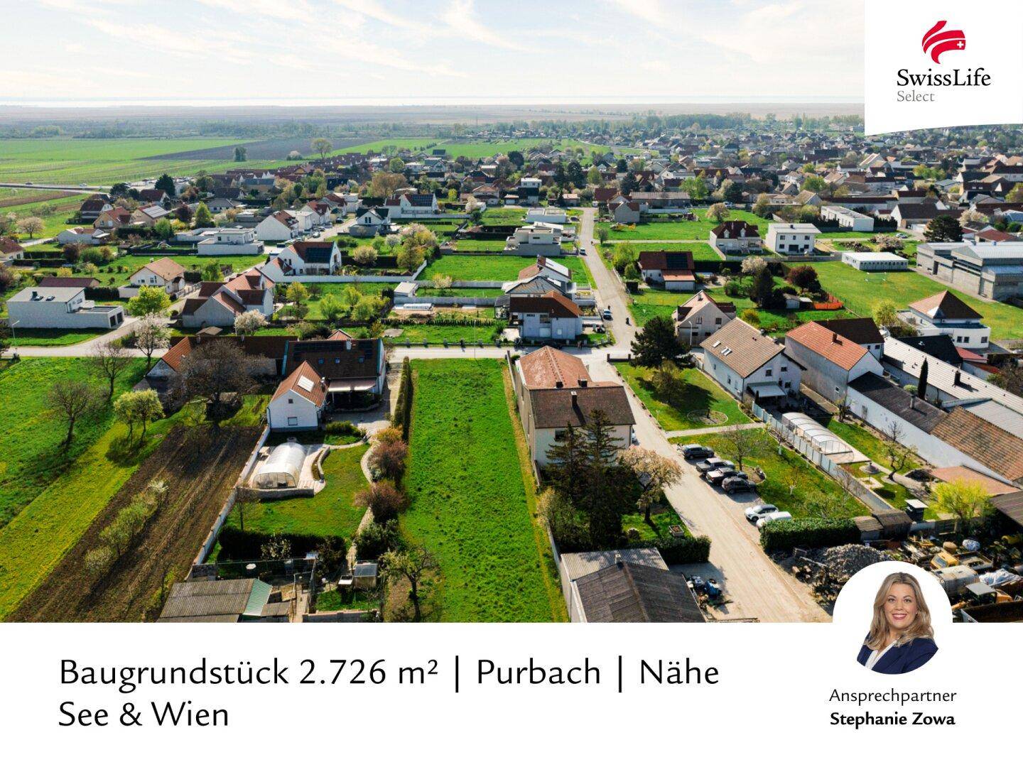 Luftaufnahme eines Baugrundstücks in Purbach mit Blick auf die Umgebung und den Neusiedler See.