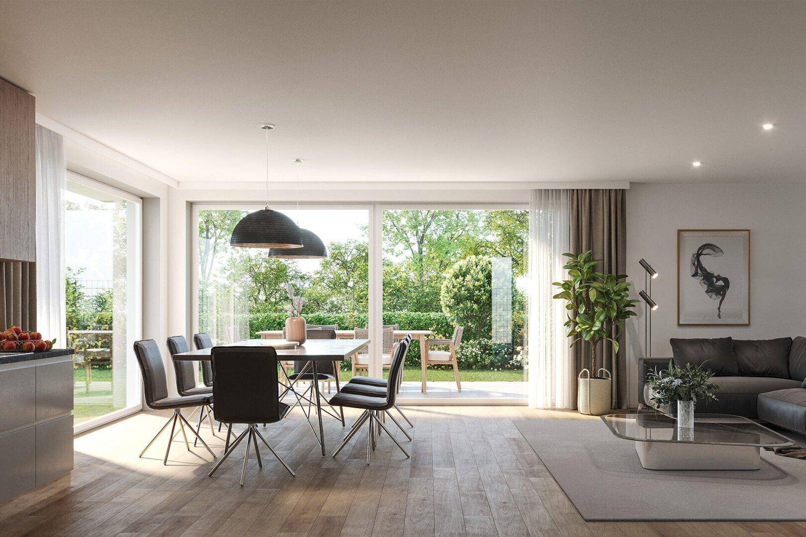 Heller Wohn- und Essbereich mit Holzboden, großen Fensterfronten und Zugang zum Garten.