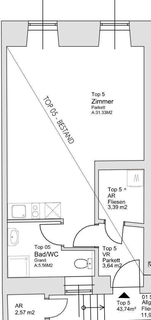 Grundriss einer Wohnung mit Zimmer, Bad/WC und integrierter Küchenzeile.