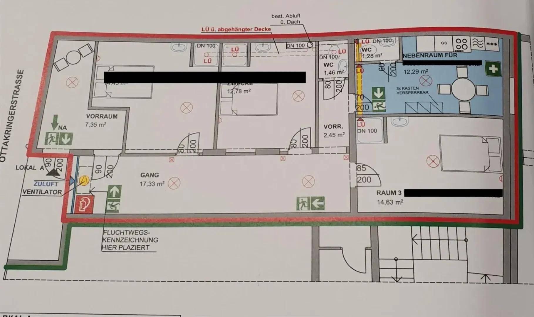 Grundrissplan eines Gewerbeobjekts mit mehreren Räumen, zwei Toiletten und einer integrierten Küchenzeile.