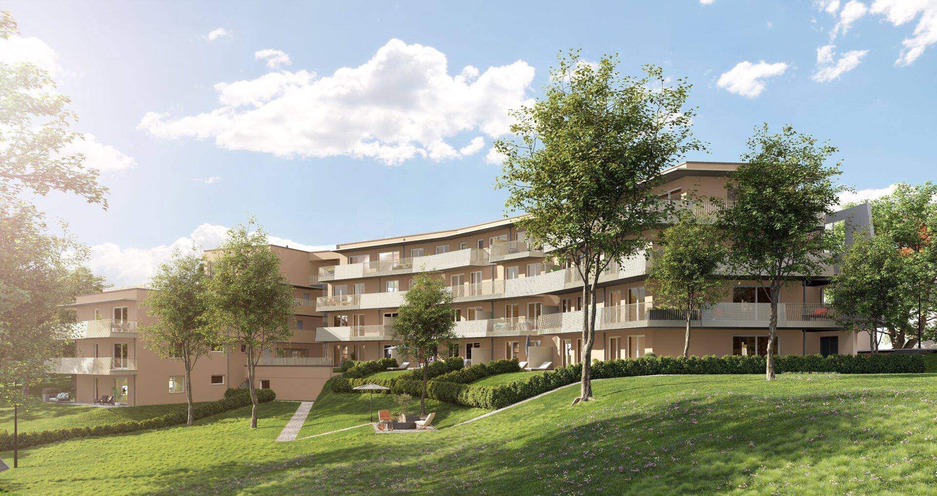 Zeitgenössisches Wohngebäude eingebettet in eine grüne Hügellandschaft mit Terrassenbereichen.