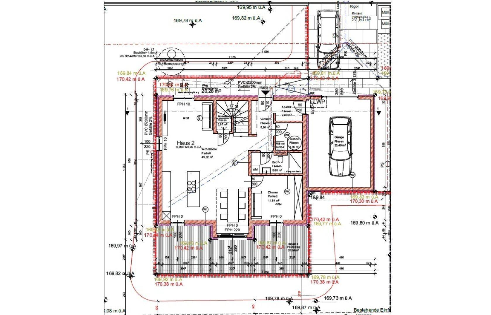 Grundriss des Erdgeschosses mit offenem Wohnbereich, Küche, WC und Garage.