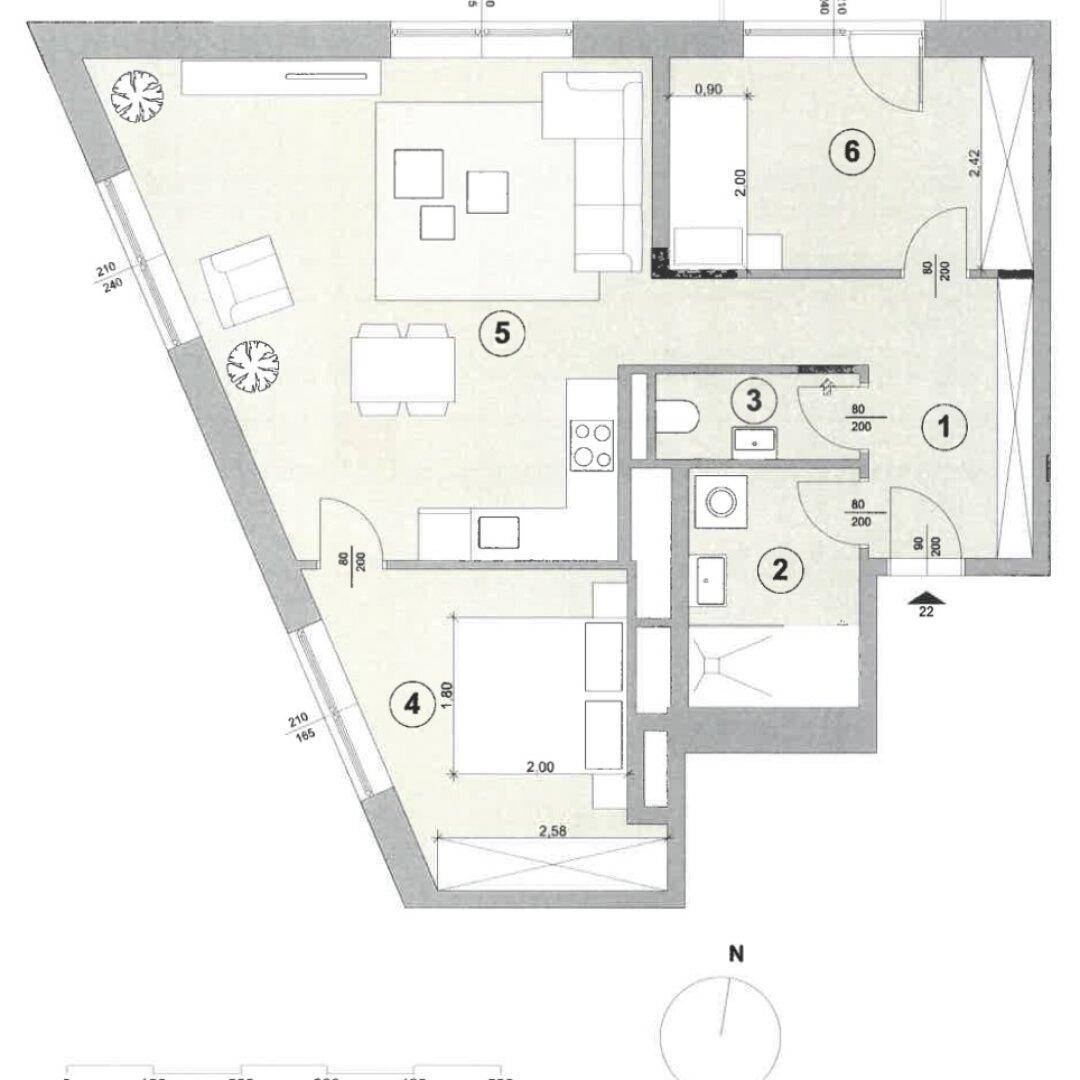 Grundriss einer Wohnung mit offenem Wohnbereich, zwei Schlafzimmern und Terrasse.