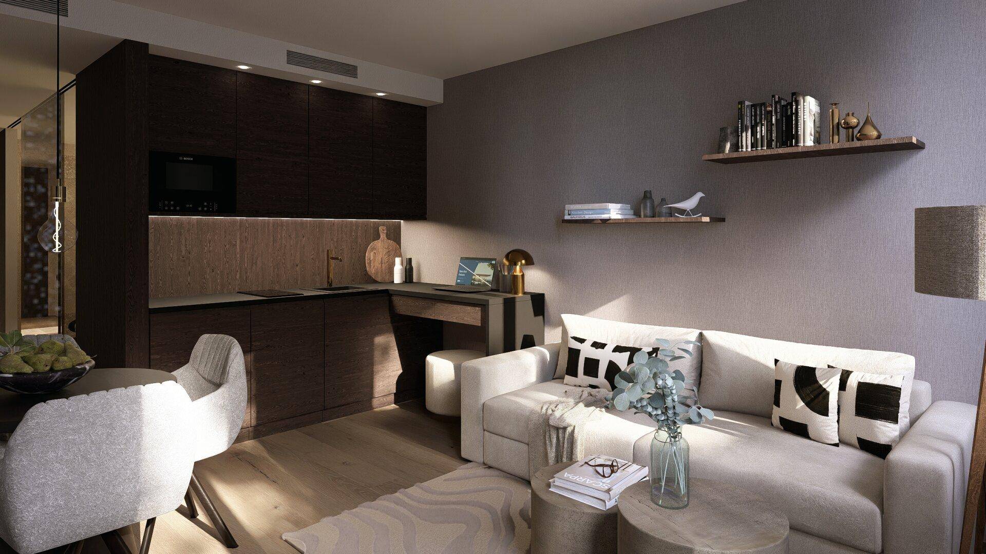 Offener Wohnbereich mit integrierter Küche, Esstisch und gemütlichem Sofa.
