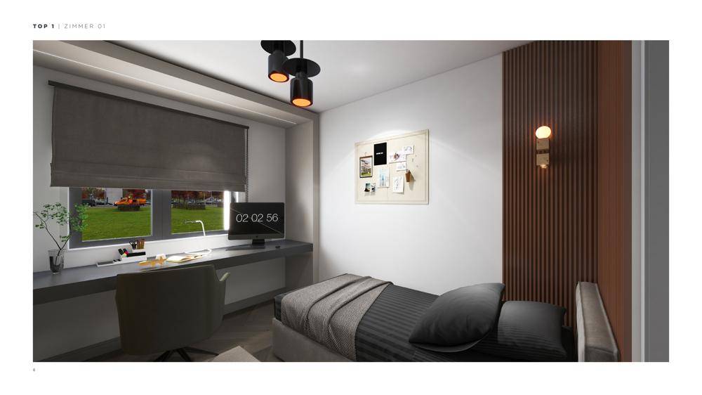 Helles Schlafzimmer mit Schreibtisch am Fenster und Blick ins Grüne.