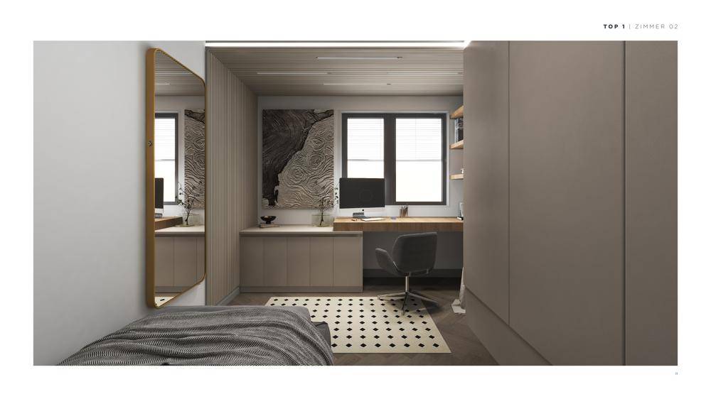 Helles Schlafzimmer mit Arbeitsbereich am Fenster und großem Wandspiegel.