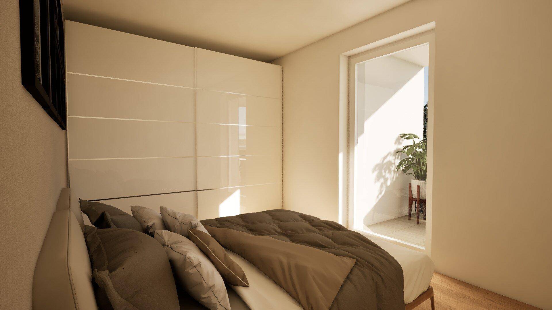 Helles Schlafzimmer mit Zugang zu einem Balkon und viel natürlichem Licht.