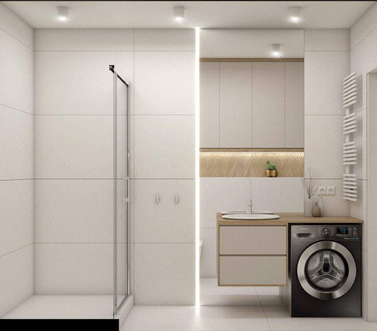 Modernes Badezimmer mit begehbarer Dusche, Waschbecken und integrierter Waschmaschine.