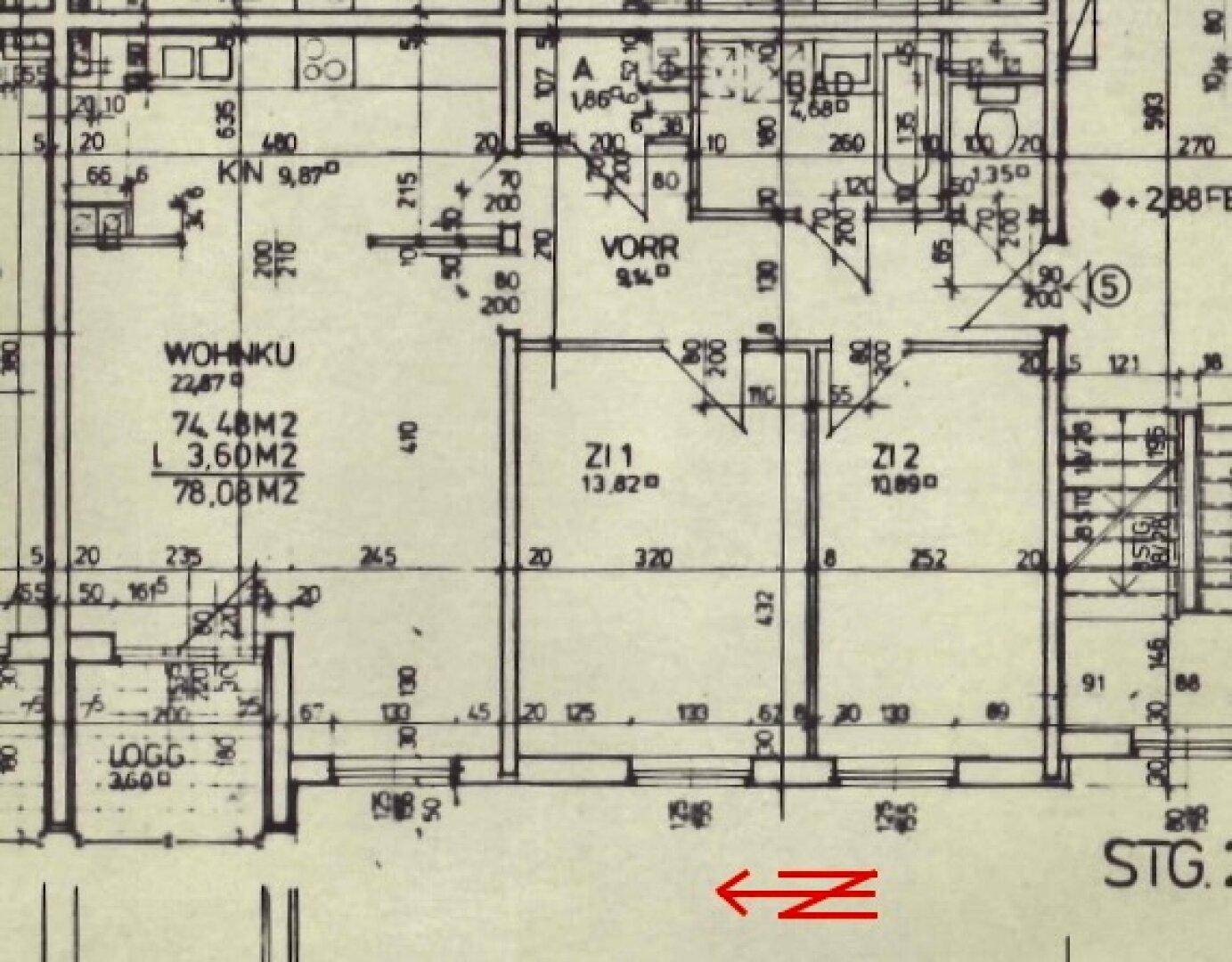 Grundrissplan mit Wohnküche, zwei Zimmern und Loggia.