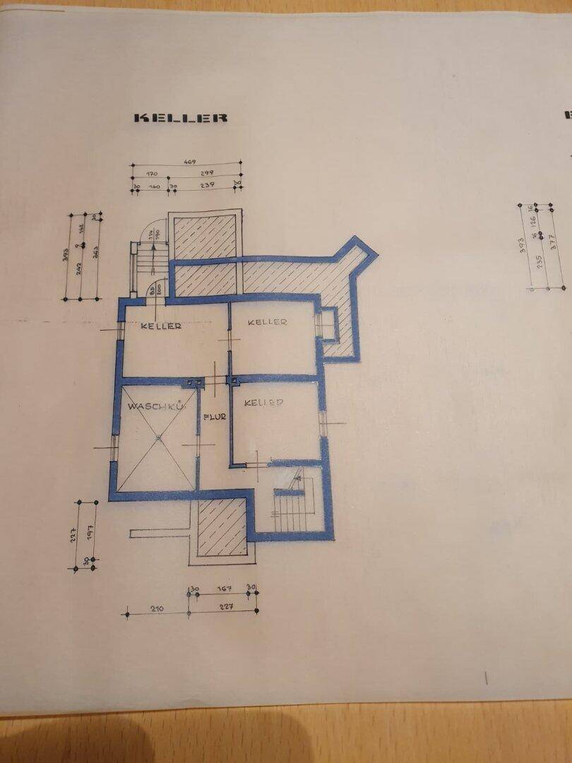Grundriss des Kellers mit verschiedenen Kellerräumen und Waschküche.