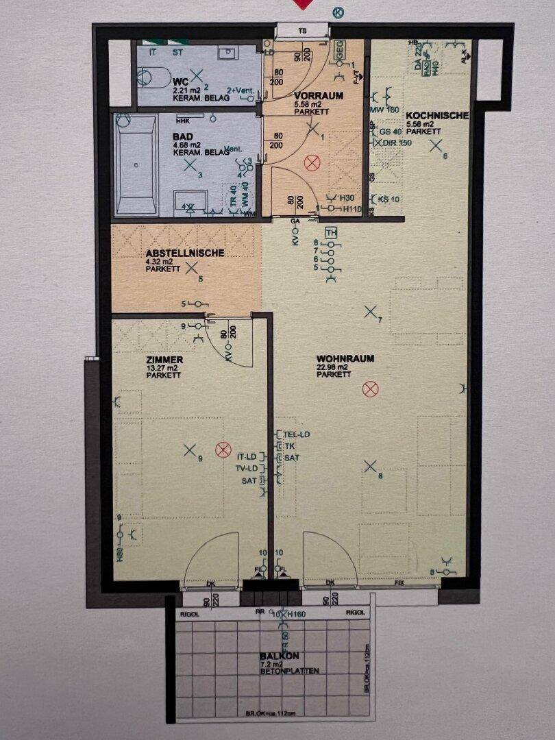 Detaillierter Grundriss einer Wohnung mit Balkon, Küche und separatem WC.