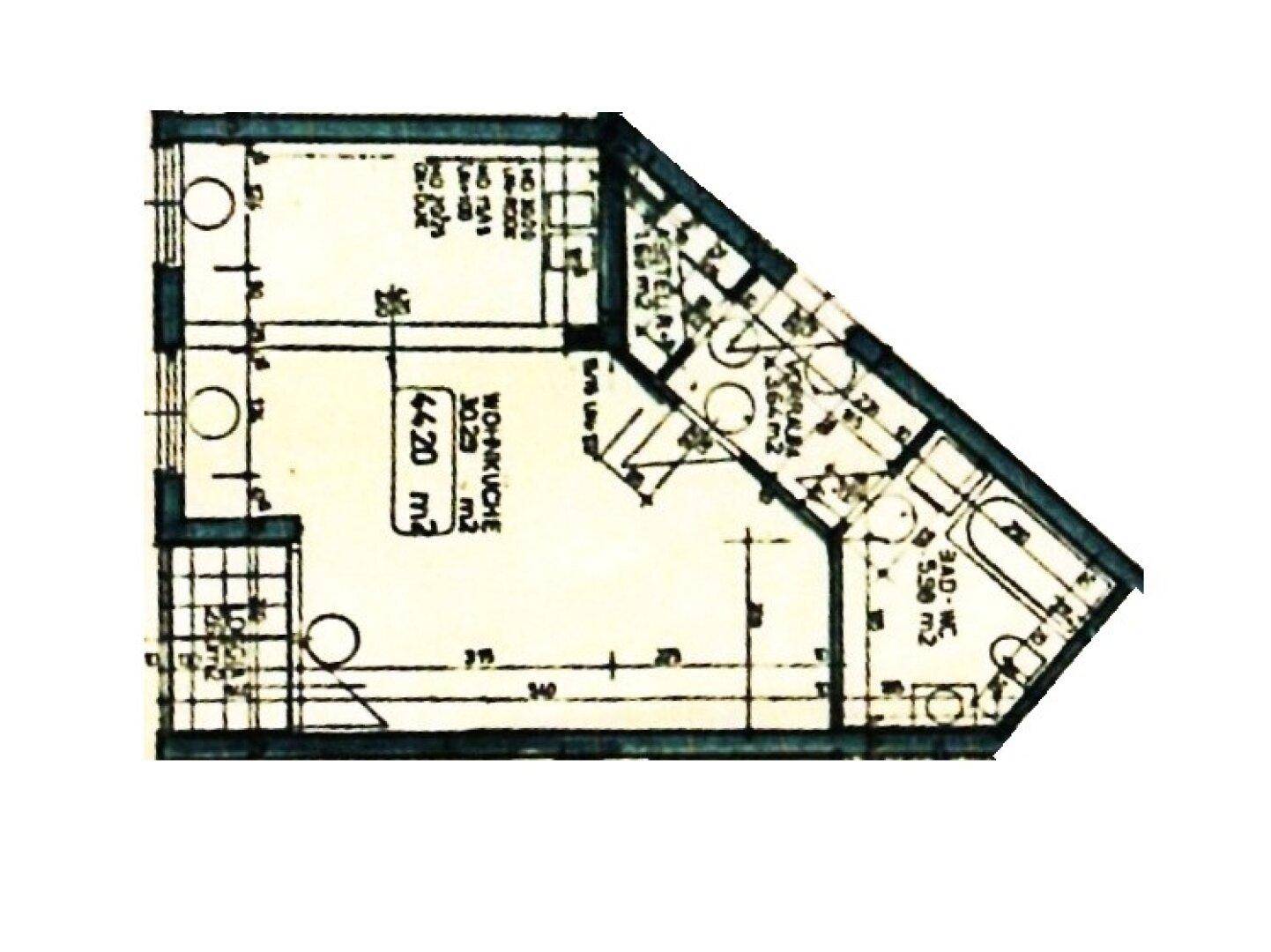 Grundriss einer Wohnung mit Wohnküche, Bad und weiteren Räumen.