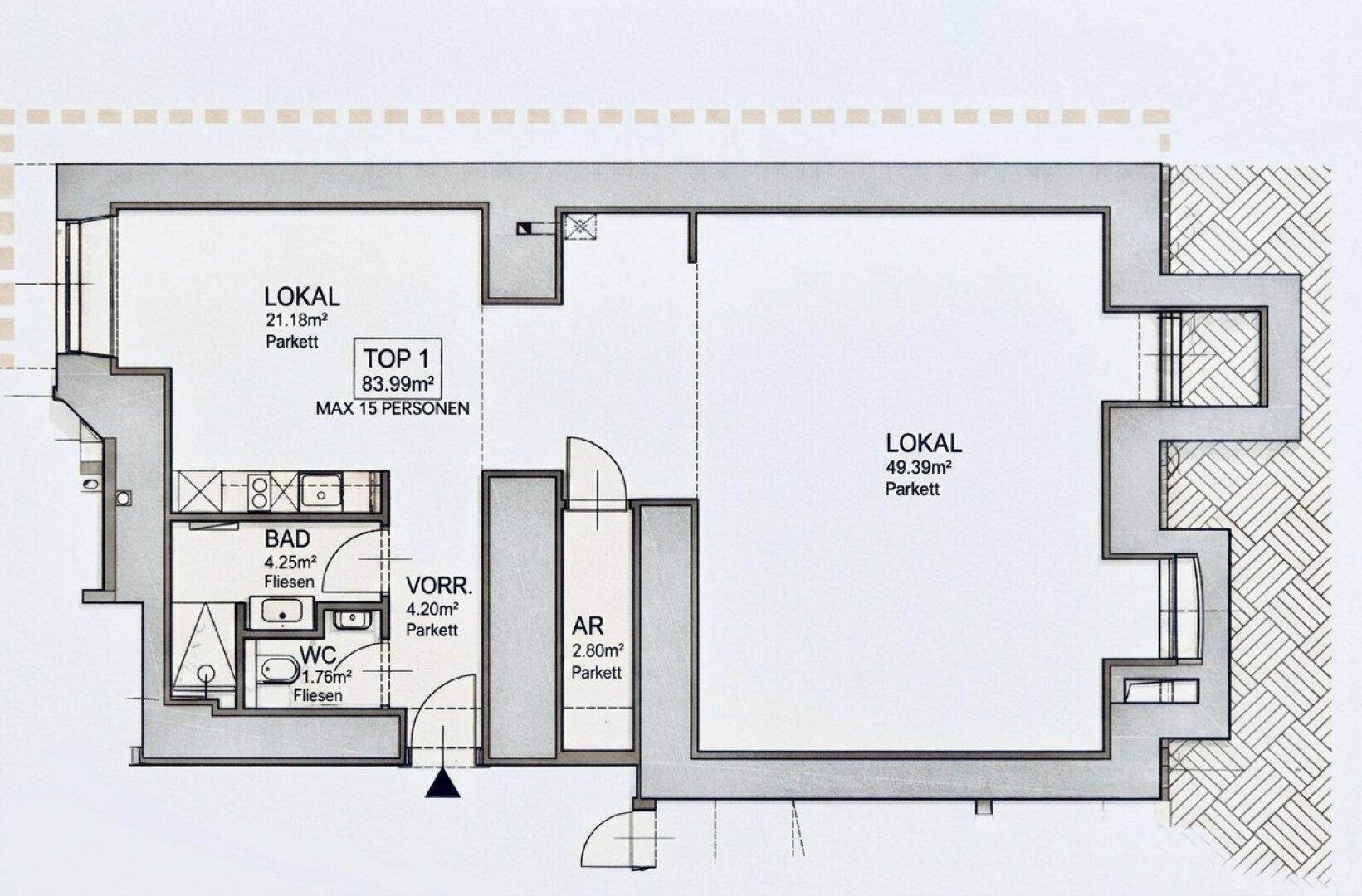 Grundrissplan einer Gewerbefläche mit Bad, WC und Vorraum, aufgeteilt in mehrere Bereiche.