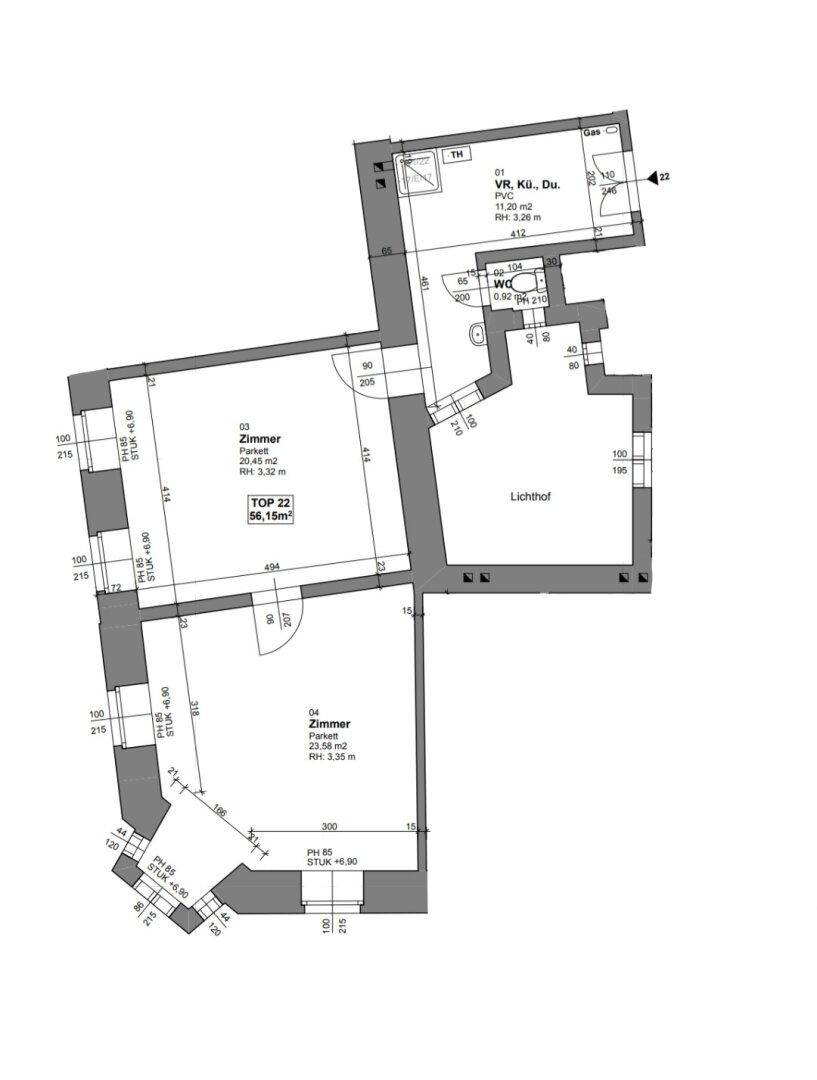 Grundriss einer Wohnung mit drei Zimmern, Lichthof und separatem WC.