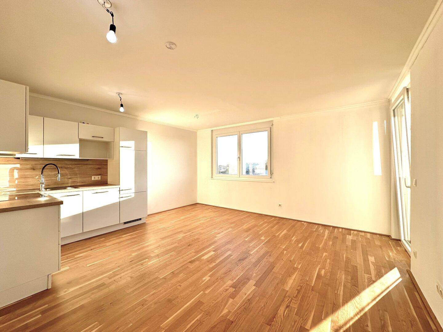 Urbanes Wohnen mit Top-Ausstattung: Moderne 3-Zimmer-Wohnung mit Terrasse &amp; Loggia - Ansicht 2