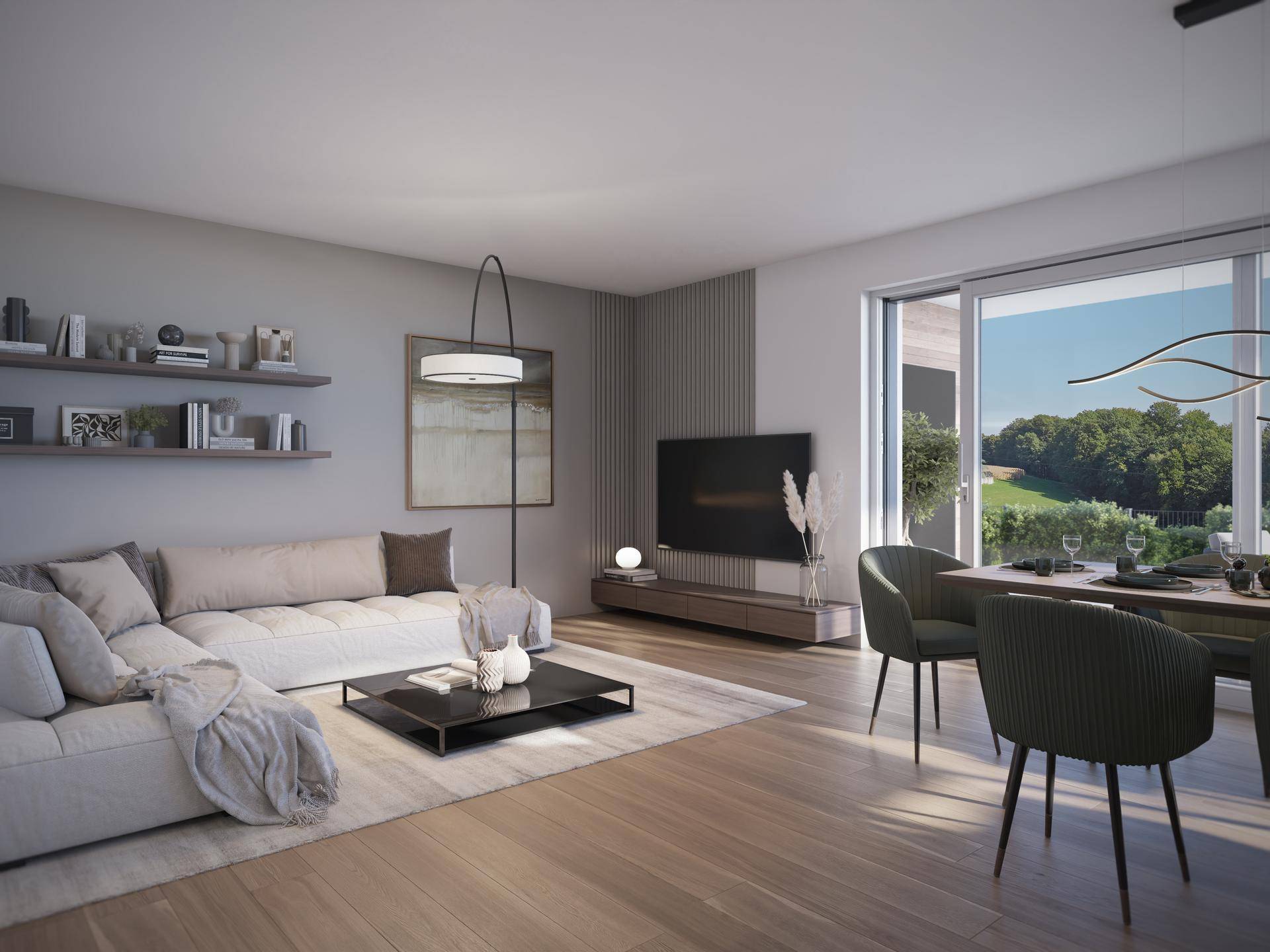 Geräumiger Wohnbereich mit bequemer Couch, Holzboden und Blick ins Grüne.