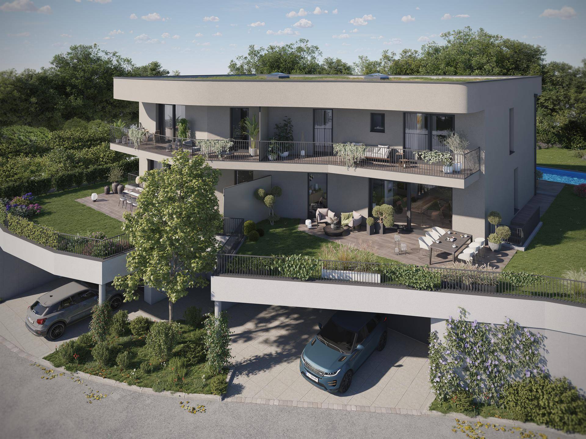 Architektonisch ansprechendes Gebäude mit mehreren Balkonen, Terrassen und Garagen in einer grünen Umgebung.
