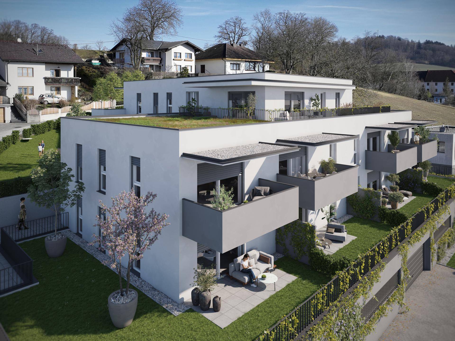 Visualisierung der modernen Wohnanlage mit weißer Fassade, Balkonen, Terrassen und begrüntem Flachdach.