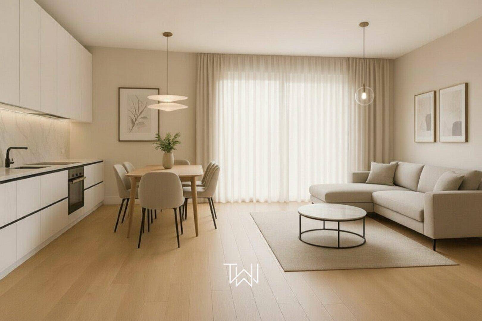 Heller, offener Wohn-Essbereich mit integrierter Küche und modernem Design.