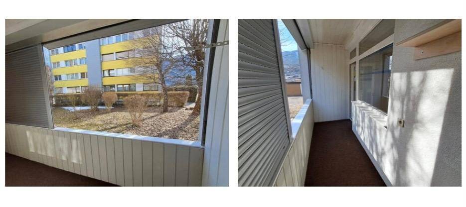 Balkon mit Blick auf die Umgebung, ausgestattet mit Rollläden für zusätzlichen Komfort und Privatsphäre.