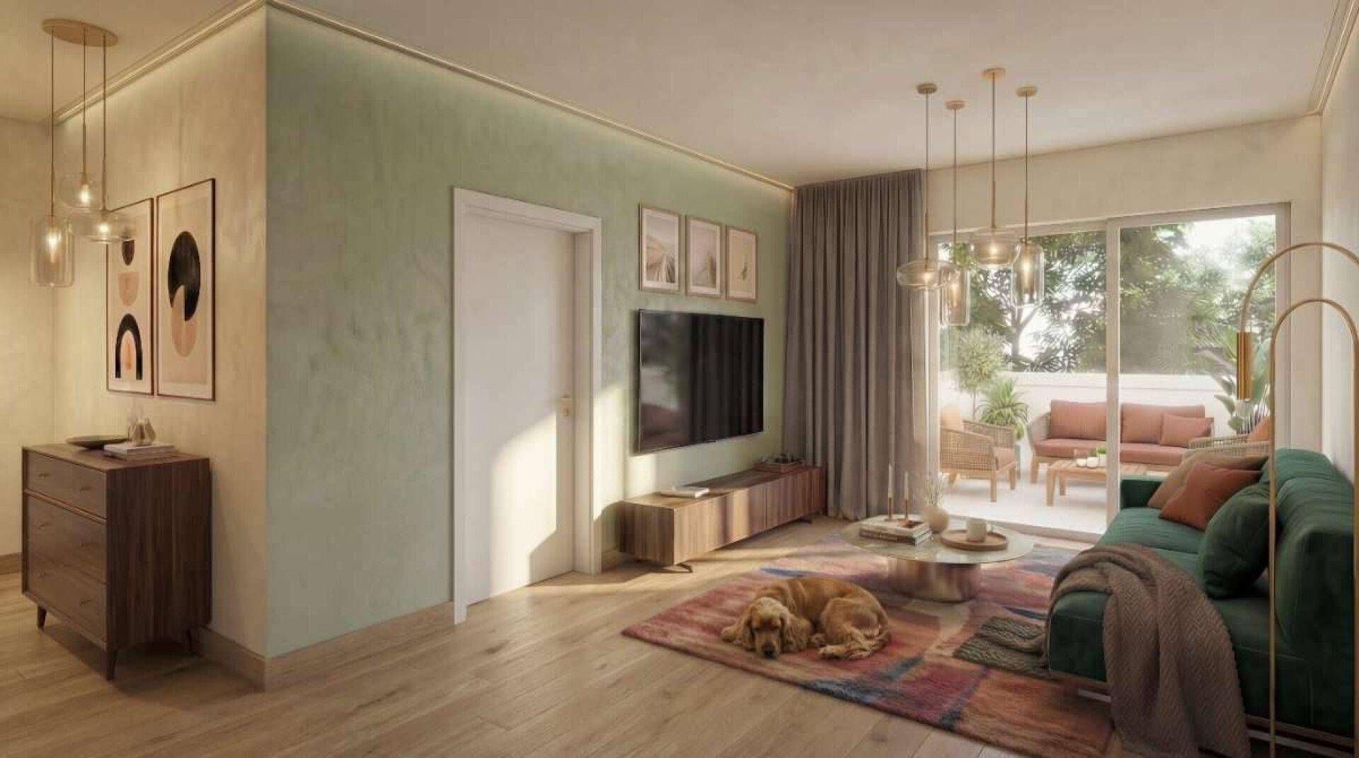 Gemütliches Wohnzimmer mit hellem Holzboden, grüner Wandfarbe und Zugang zu einer Außenterrasse.