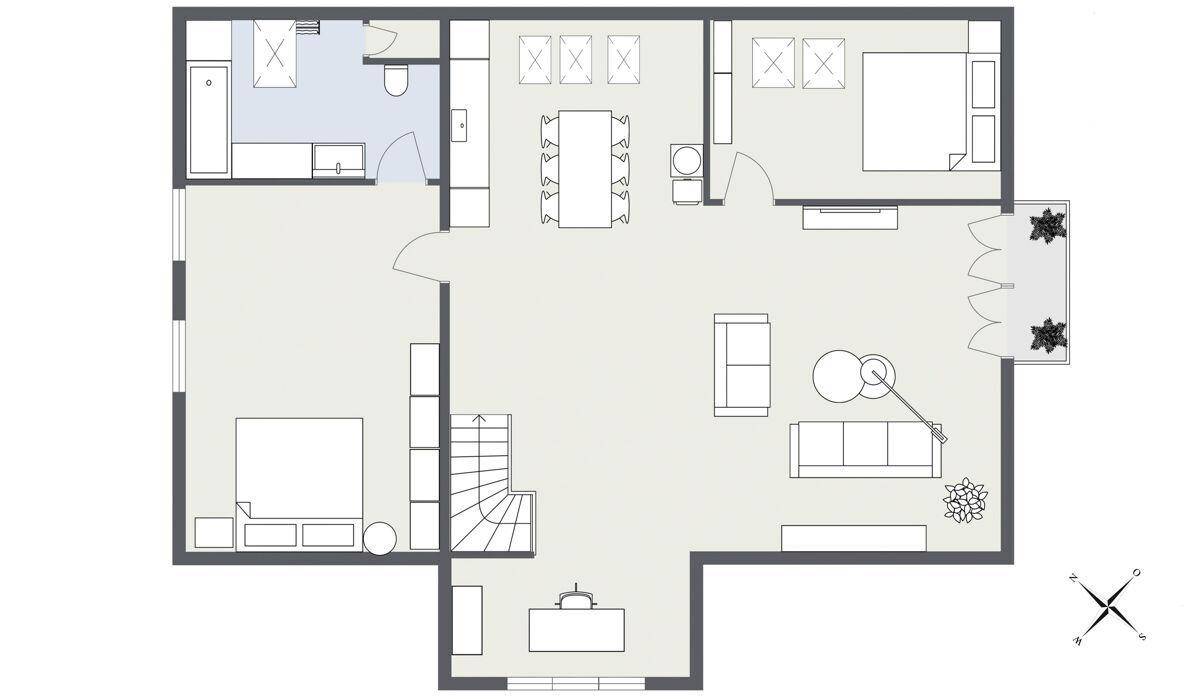 Grundriss des Obergeschosses mit Wohnbereich, Schlafzimmer und Balkon.