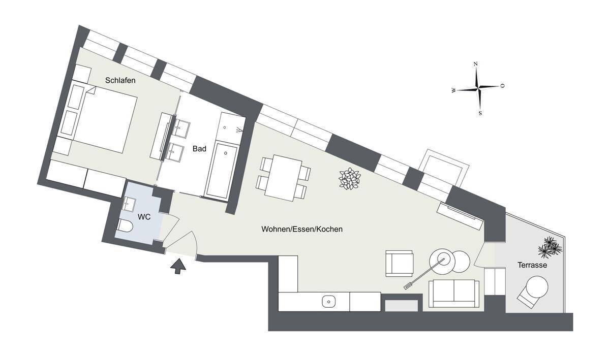 Grundriss einer Wohnung mit offenem Wohn-/Ess-/Kochbereich, Schlafzimmer, Bad und Terrasse.